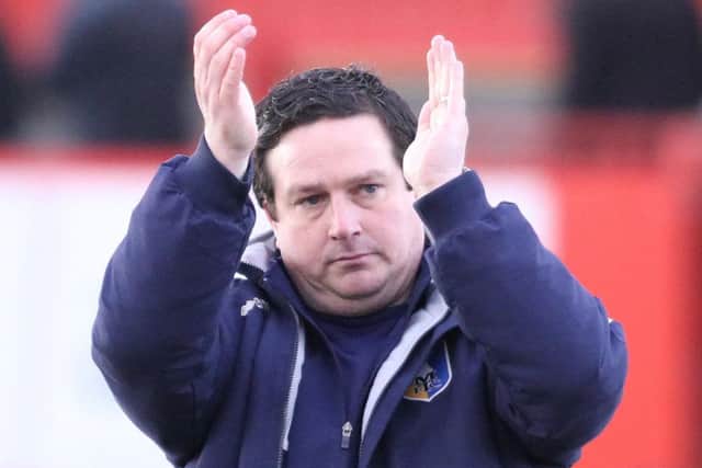 Paul Cox applauds the traveling fans  -Pic by:Richard Parkes