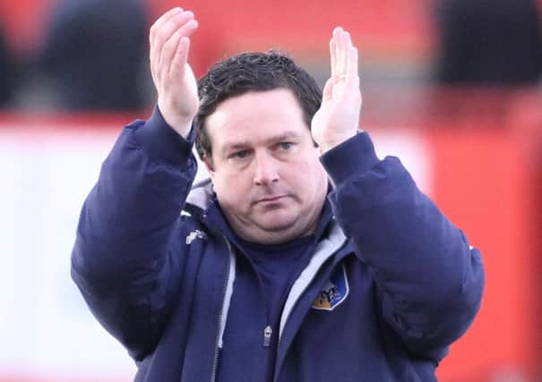 Paul Cox applauds the traveling fans  -Pic by:Richard Parkes