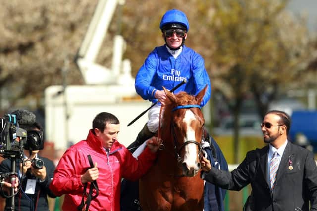 Dawn Approach and jockey Kevin Manning celebrate winning the Qipco 2000 Guineas Stakes during the 2000 Guineas Day during the 2000 Guineas Day of the QIPCO Festival at Newmarket Racecourse, Suffolk. PRESS ASSOCIATION Photo. Picture date: Saturday May 4, 2013. See PA story RACING Newmarket. Photo credit should read: Sean Dempsey/PA Wire