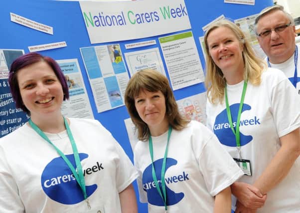 Stall in Idlewells Shopping Centre Sutton as part of National Carers Week. l-r Natasha Mellors and Zena Cameron from the Carers Federation, Kate Whittaker NCC, Steve Shaw Ashfield Voluntary Action.
