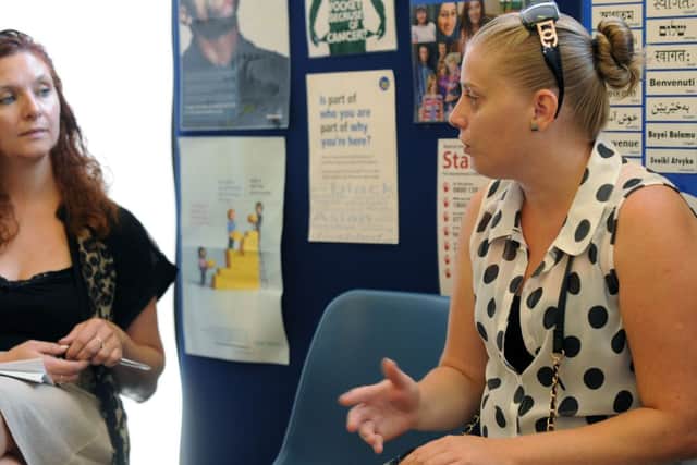 Client visits CAB, Sutton to discuss debts.