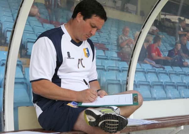 Paul Cox makes the final tweakings to his team selection  -Pic by:Richard Parkes