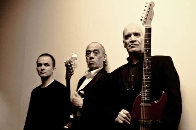 Wilko Johnson, far right, and his band.