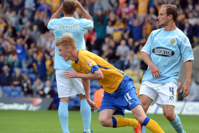 Mansfield Town v Dagenham and Redbridge.
Clucas turns away having just headed the Stags into the lead.