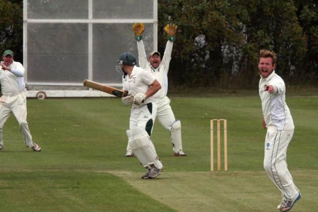 Glapwells Lee Topham is plumb LBW as Clipstones bowler Lewis Spriggs and keeper Lee Wilson appeal.