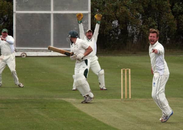 Glapwells Lee Topham is plumb LBW as Clipstones bowler Lewis Spriggs and keeper Lee Wilson appeal.