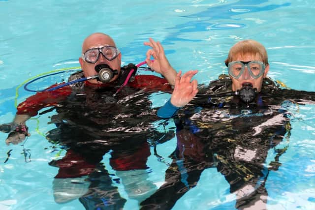 OK to dive Charlie Bearow and Cherie Winnard.