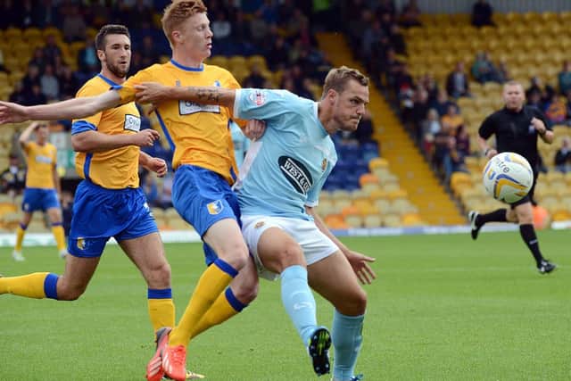 Mansfield Town v Dagenham and Redbridge.Clucas is halted.