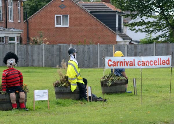 Scarecrows welcome drivers through Glapwell over the weekend, which saw the village's carnival cancelled due to bad weather.