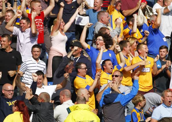 Mansfield Town fans celebrate after Calvin Andrew puts them ahead in the local derby at the Proact Stadium by Tina Jenner Chesterfield  v Mansfield Town
