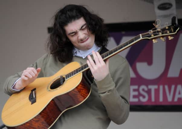 Oxjam Music Festival, Mansfield. Pictured is Pat Cunningham performing at the main stage in Mansfield Town Centre.