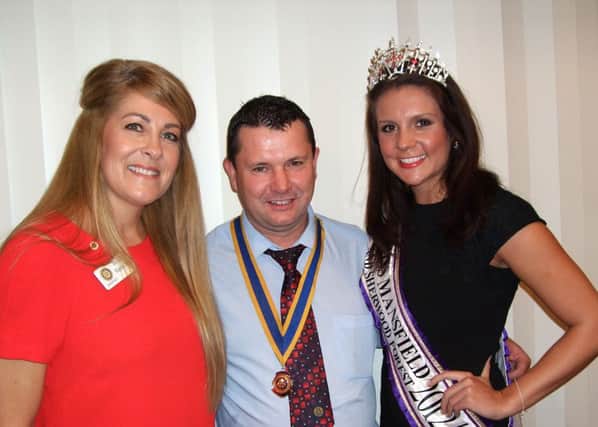 The reigning Miss Mansfield Alice Kurylo and the competition director Trish Mapletoft with Joint President of Kirkby Rotary Club, John McEwen
