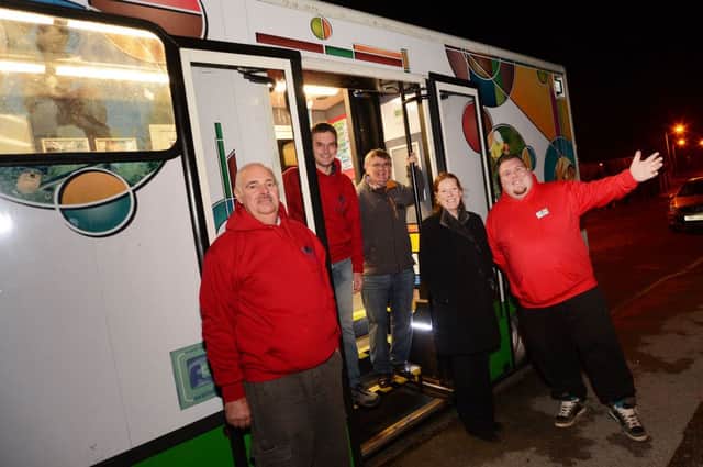 All aboard! Youth workers open the doors of the Youth bus to welcome youngsters from the Peafield Lane estate in Mansfield Woodhouse.  Pictured are from left, Eric Morgan, Darrell Johnson, Bill Pearce, Coun. Joyce Bosjnak and Frazer Guy.