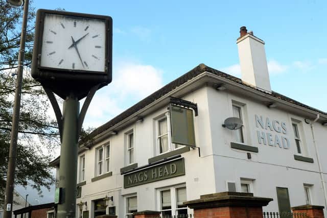 Nags Head clock, Kirkby.