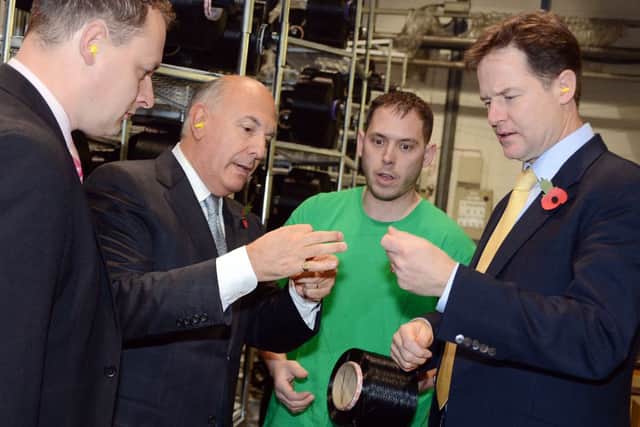 Deputy Prime Minister, Nick Clegg, chats with Steven Hare, and Autofil managing director Anthony Ullmann, when he toured the Annesley factory with Coun. Jason Zadrozny. right.