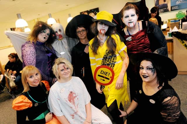 Halloween fancy dress at Specsavers, Mansfield. back l-r Hayley Mason manager, Katie Morris, Amanda Lee manager who is currently undergoing treatment for breast cancer, Laura Penny, Kelly Graham. front l-r Kara Bartlett, Tiffany Mills and Sarah Alberry.