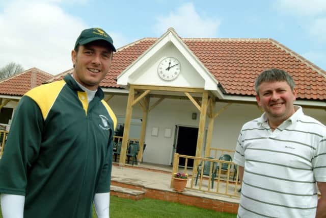 09-0977-3Fransfield, new Premier League facilities at Farnsfield Cricket Club. Club Captain Paul Franks and Chairman Brendon Doherty are pictured on Saturday outside the new pavillion.