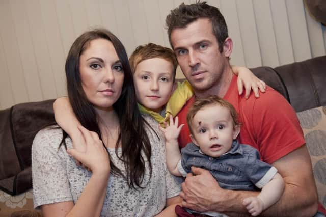 Baby Theo with mum Colleen, dad Travis and brother Alfie