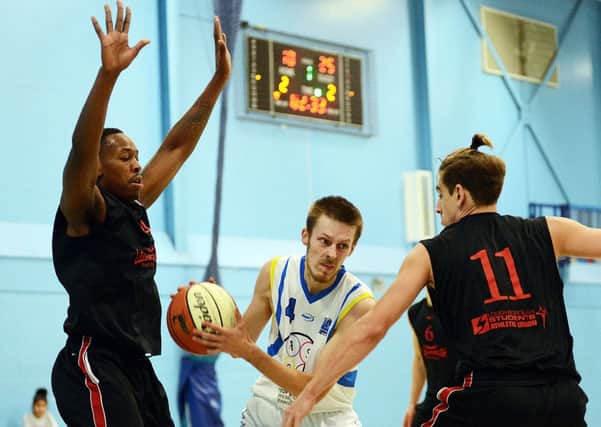 Basketball action between Mansfield Giants and Loughborough.