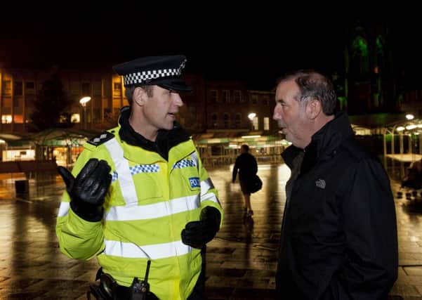 Police and Crime Commissioner Paddy Tipping takes a walk around Mansfield Town Centre on Monday with Inspector Neil Williams, Safer Neighbourhood Inspector for Mansfield South to see how crime can be tackled