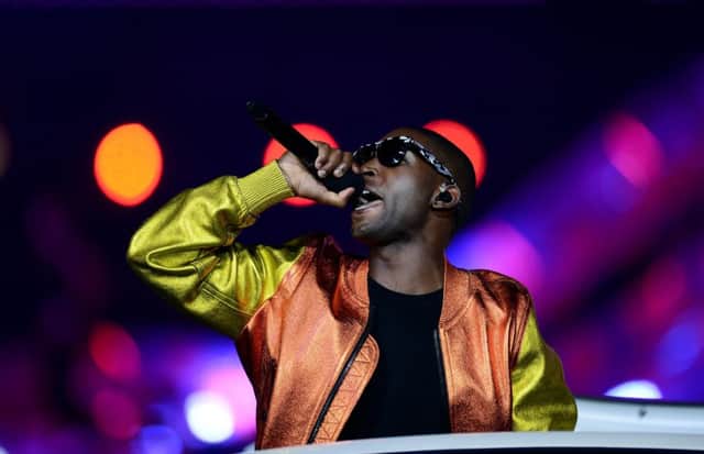 Tinie Tempah performs during the Olympic Games Closing Ceremony at the Olympic Stadium, London. PRESS ASSOCIATION Photo. Picture date: Sunday August 12, 2012. See PA story OLYMPICS Ceremony. Photo credit should read: Owen Humphreys/PA Wire. EDITORIAL USE ONLY