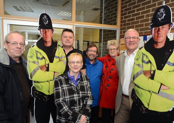 Cardboard coppers with from left, Mick Green, Myrrha Hibbert, Inspector Nick Butler, Kevin Breedon vice-chairman of the Hucknall West Safer Neighbourhood committee, their chairman Mary Stirland and Coun. Chris Baron.