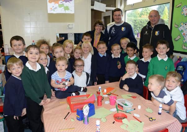 Mansfield Town manger Paul Cox visited John T. Rice School to take part in a craft morning with pupils G131015-1