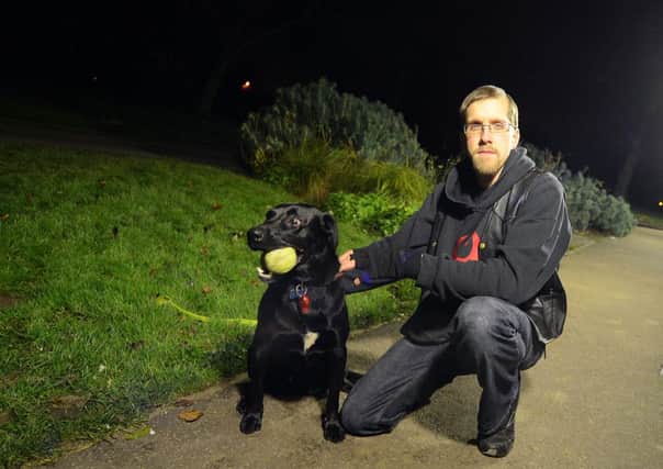 Matt Williams with his dog Rascal on Titchfield Park, Hucknall.