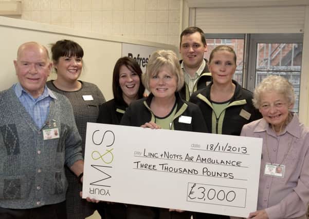 Staff at the Marks & Spencers Mansfield Westgate store have held various fundraising events over the past 18 months and raised £3000 for the Linc and Notts Air Ambulance, which they presented to fundraising volunteers sue and Gerald Halpin on Monday. Handing over the cheque (l-r) store manager Lauren Robinson and sports and social events organisers, Tracy Plumb, June Mason, Will Atkinson and Lorraine Renshaw. Lynn Phillips was not available for the photograph.