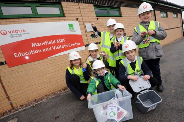 Kids from Greenwood Primary, Kirkby visit Materials Recovery Facility to enjoy activities. back l-r is Corday Millan 10, Lucie Turner 11, Erin Reed 8, Indie Gibson 7, Harvey Clipstone 7. front is Jenson Hawkins 7 and Charlotte Griffiths 10.