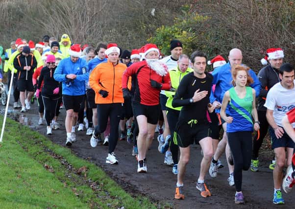 Runners get going on their Park Santa Run held at the Manor Complex on Saturday morning.