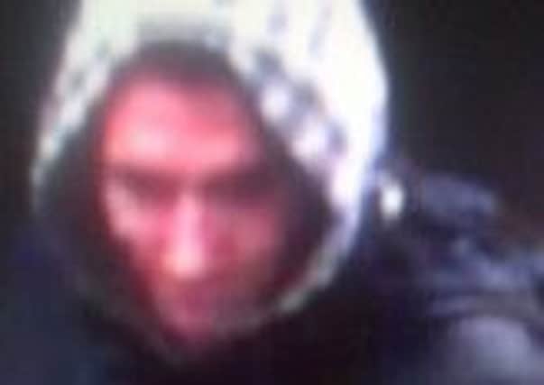 Image from CCTV cameras of a man police want to speak to in relation to a theft at the Co-op on Huthwaite Road, Sutton.