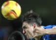 Ryan Tafazolli heads clear under pressure -Pic by:Richard Parkes