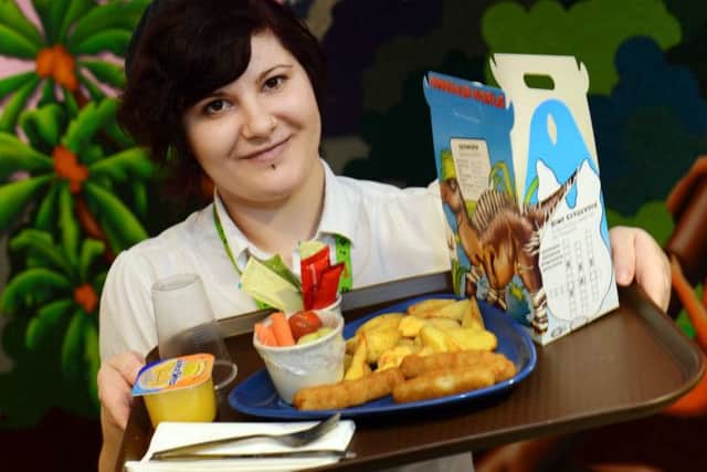Ward hostess Nicolle Clark with one of the lunches after Kings Mill Hospital launched new child friendly meals.