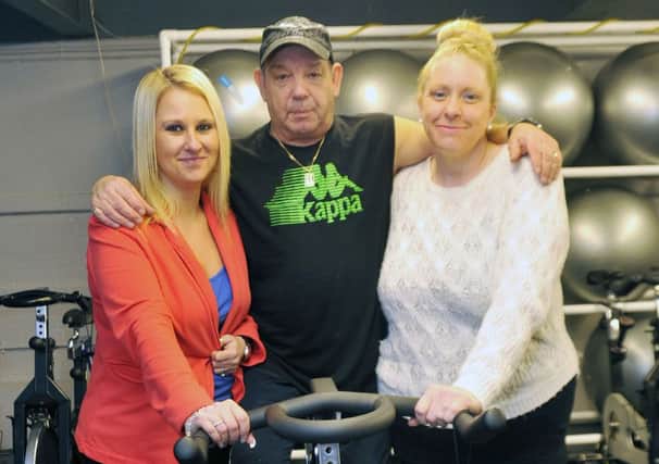 Two members of Oxygen Fitness have lost weight through exercise alone, pictured are Kelly Wyatt and Maria Ceney with gym instructor Jeff Gayton (NMAC-09-01-14 RA 1a)