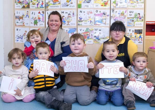 Children and staff at the Tiny Tots Nursery, Hucknall prepare for the I Can's Chatterbox Challenge 2014 'Sounds Like Fun with Humf' to be held on the 11th February