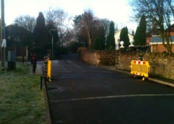 All that remains of the gates on Willowbridge Lane, off Dovedale Avenue in Sutton