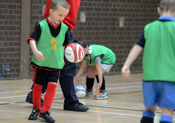 Youngsters who attend the indoor soccer school at Hucknall Leisure Centre are put through their paces in the 4-6 year old group.