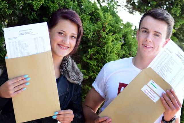 Garibaldi G.C.S.E. results.Demi Wharmby and Tom Hunt with their results.
