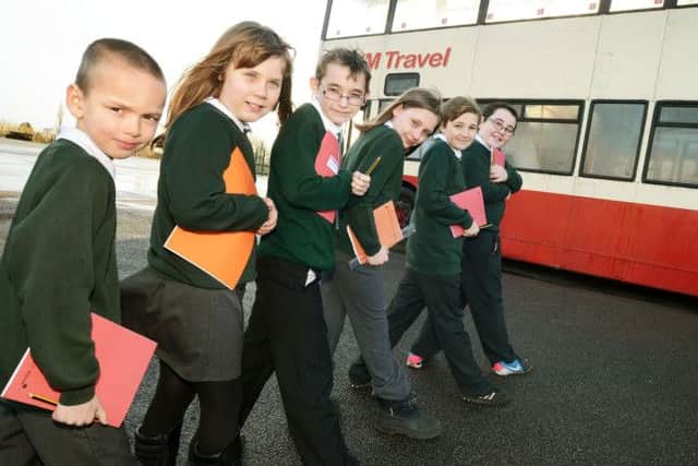Broomhill Junior School pupils, Finley Straw, Kian-Ray Gratrix, Nathan Hammond, Bethanyanne South, Mckenzie Stevenson and Dewi Priestley get ready for lessons on their new 'mobile' classroom in the shape of a double decker bus which is to undergo refurbishment into a learning friendly interior.