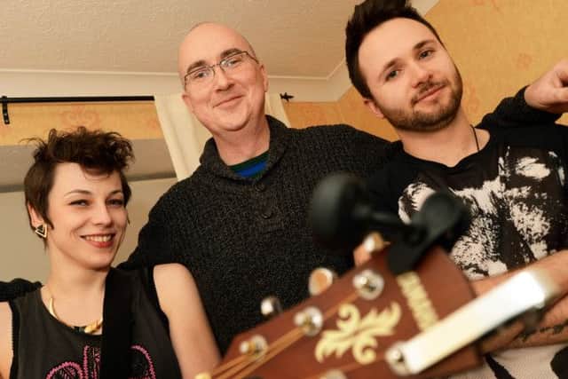 Huw Lynd-Evans, centre, at his home in Sutton with up and coming band Rita Payne who put on a concert in his front room.