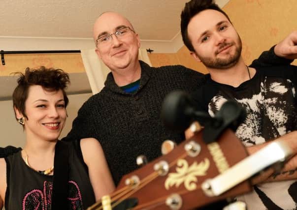 Huw Lynd-Evans, centre, at his home in Sutton with up and coming band Rita Payne who put on a concert in his front room.