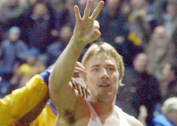 Liam Lawrence celebrates scoring an FA Cup hat-trick agsainst Wycombe in December 2003.