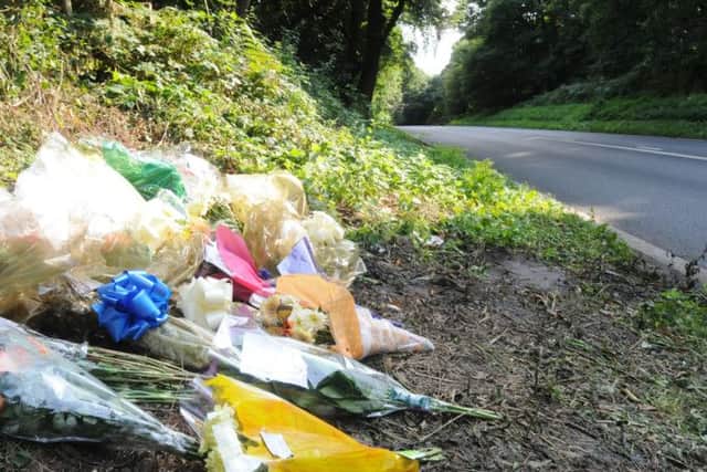 Flowers laid in memory of Luke Winter at the site of the crash.