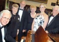 08-1499-1Pictured at the Summer Concert held by the Mansfield Choral Society at Queen Elizabeth School last Saturday night are from left, Neville Ward, club treasurer Annette Knight, Mike Neaum, chairman Jean Dalton, soloist Rosie Hill and musical director David Wilson