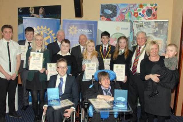 The nine youngsters with Mansfield mayor Tony Egginton, Les Marshall of sponsor the Schools Advisory Service, and Rotn John Whiteley, president of Mansfield Rotary Club.