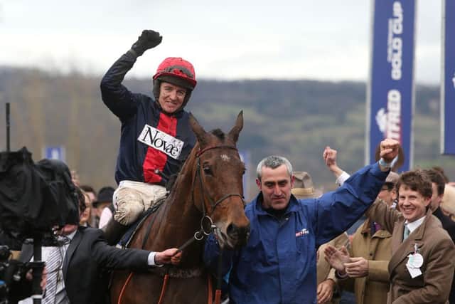Jockey Barry Geraghty celebrates after winning the Betfred Cheltenham Gold Cup Chase on Bobs Worth during the Cheltenham Gold Cup Day on Day Four of the 2013 Cheltenham Festival at Cheltenham Racecourse, Gloucestershire. PRESS ASSOCIATION Photo. Picture date: Friday March 15, 2013. See PA story RACING Cheltenham. Photo credit should read: David Davies/PA Wire