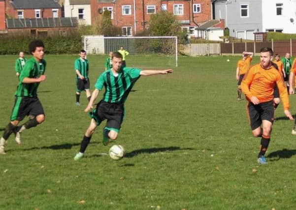Sunday March 9's local derby in League Seven featuring Clay Cross Miners and Diners [green/black stripes] v Britannia Tupton [tangerine] which finished 3-1.