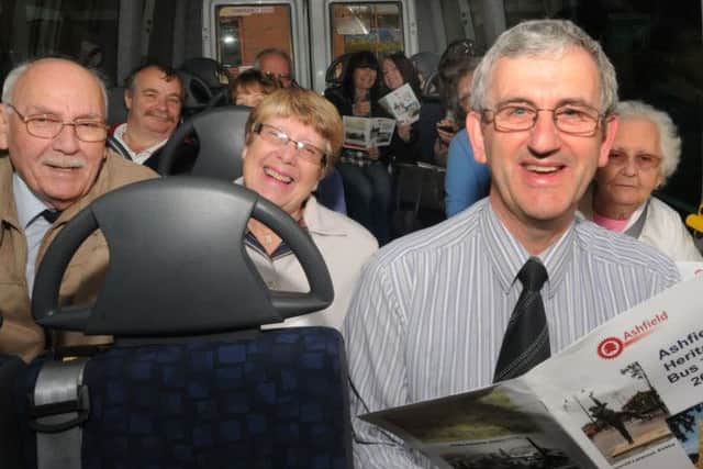 .Dennis Hill right takes a heritage bus tour today from Kirkby