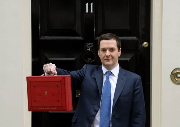 Chancellor of the Exchequer George Osborne outside 11 Downing Street before heading to the House of Commons to deliver his annual Budget statement. PRESS ASSOCIATION Photo. Picture date: Wednesday March 19, 2014. See PA BUDGET stories. Photo credit should read: Anthony Devlin/PA Wire